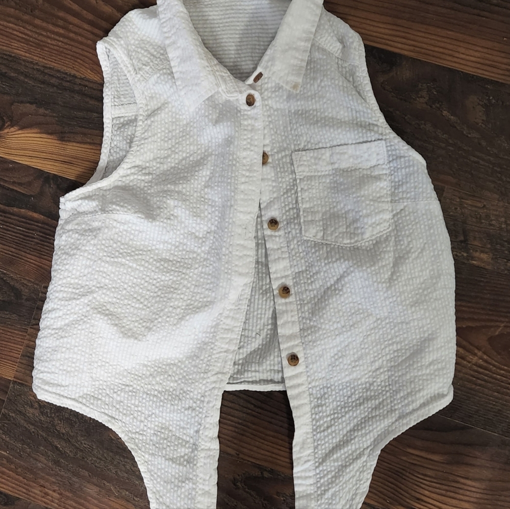 H&M girls size 10 white tie bottom shirt. Sleeveless. Cute. No stains or tears